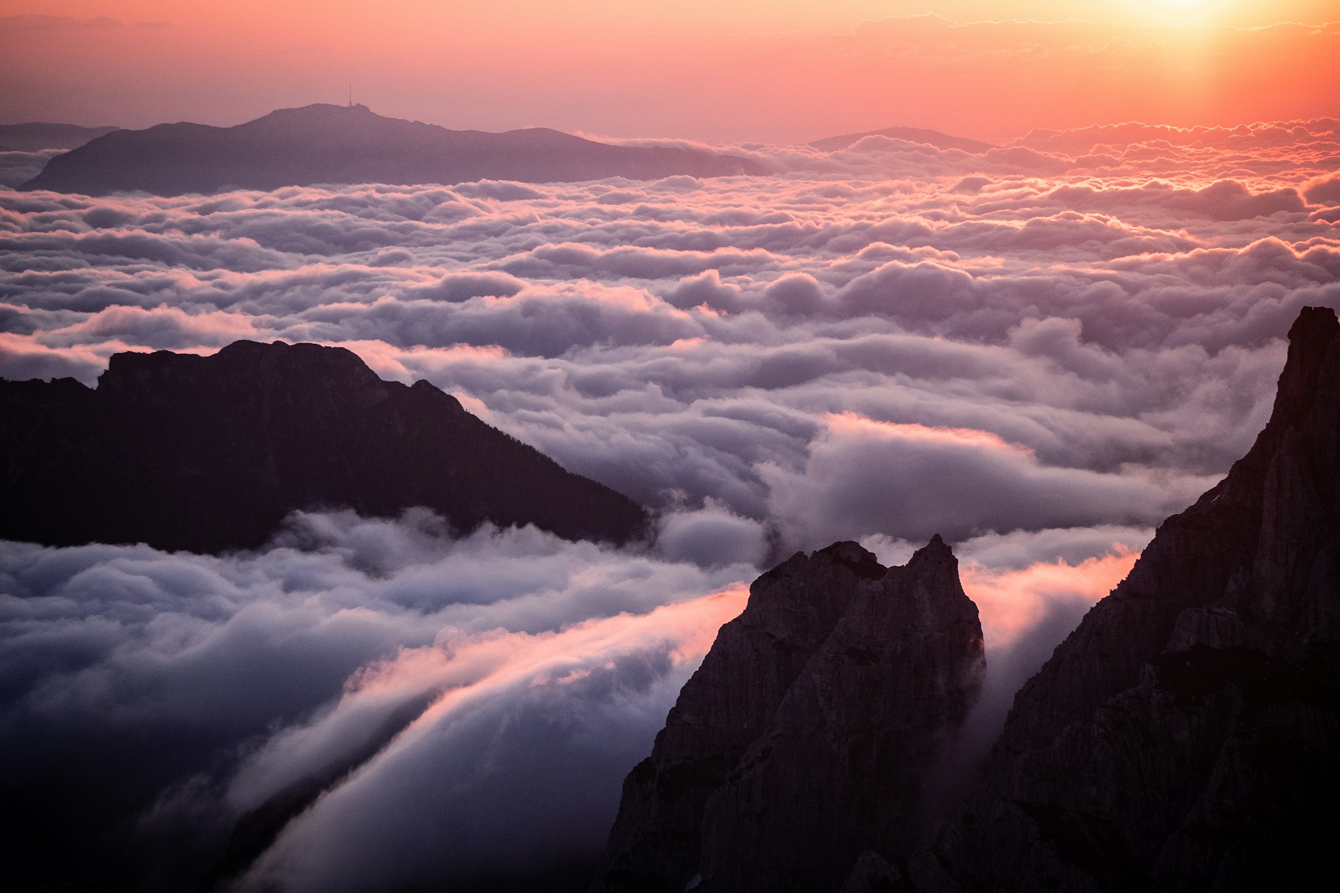 A breathtaking view of the Holy Mountain at sunrise, showcasing its majestic peaks and serene atmosphere.