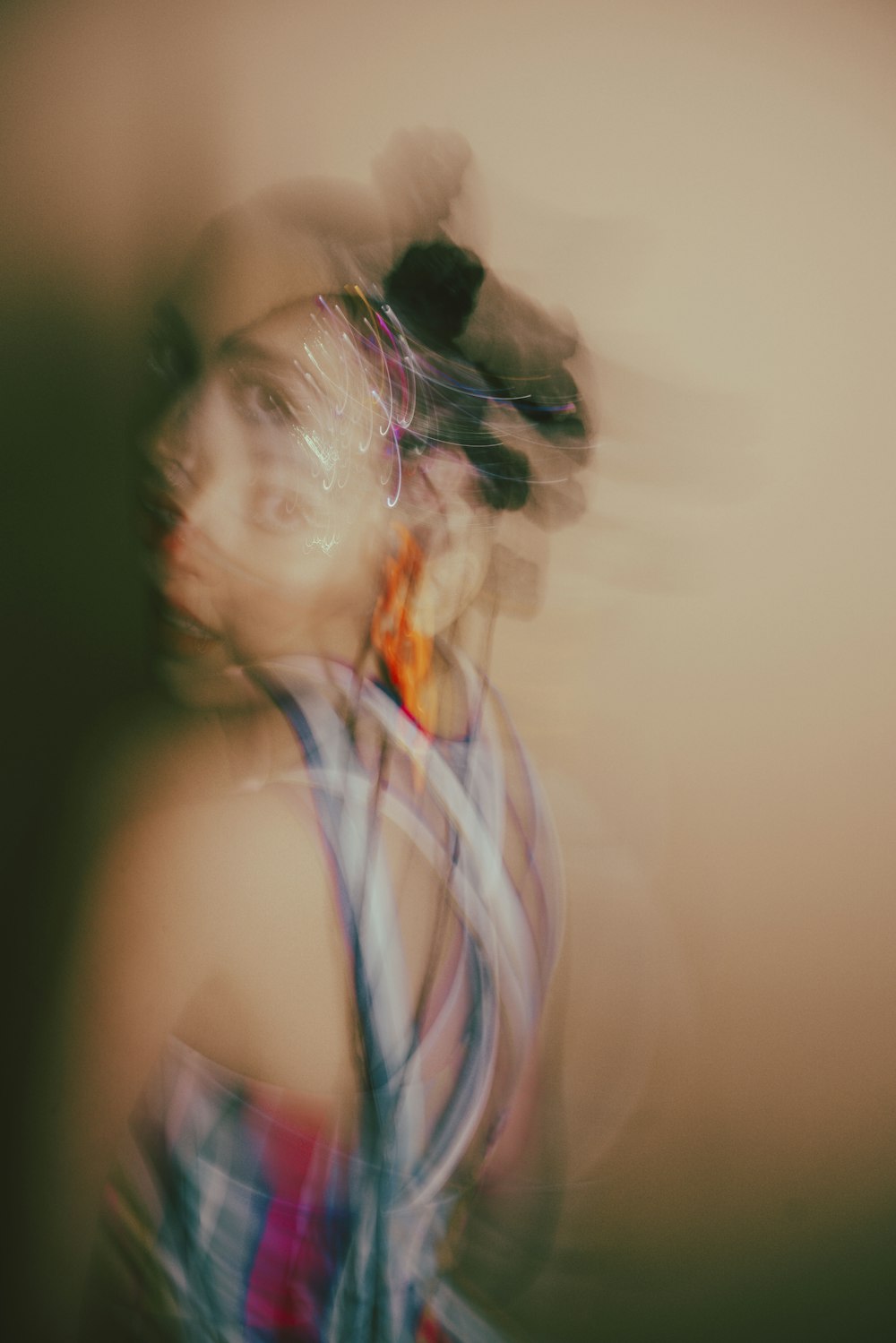 a blurry photo of a woman in a dress