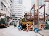 A busy construction site with workers and machinery, representing the BTP sector.