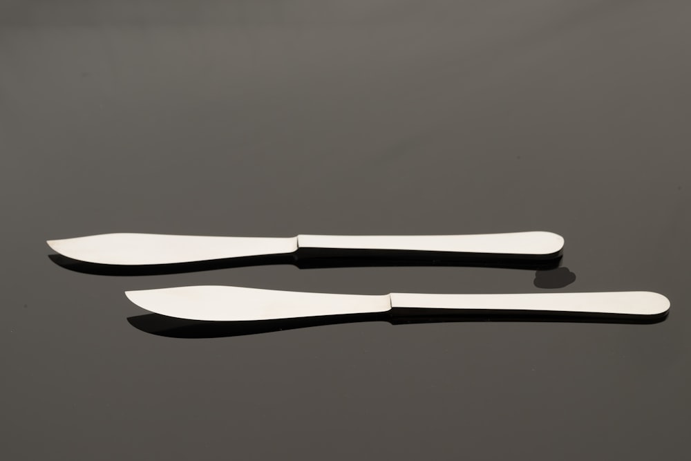 a pair of scissors sitting on top of a table
