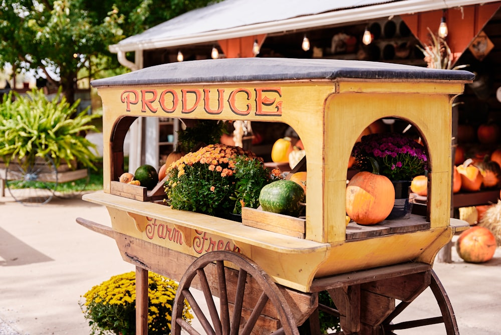 a fruit and vegetable cart with produce in it