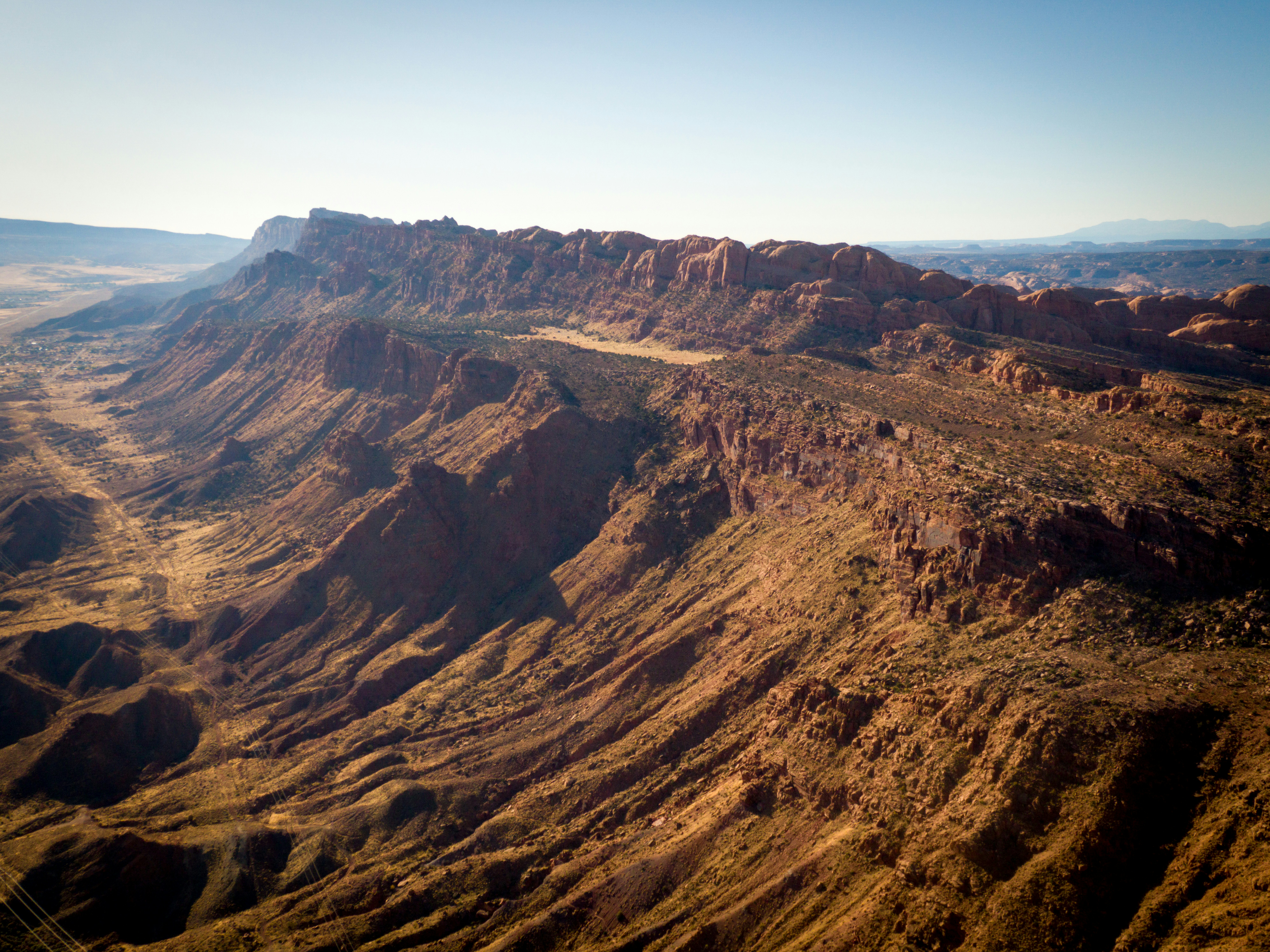 an aerial view of a mountain range in the desert