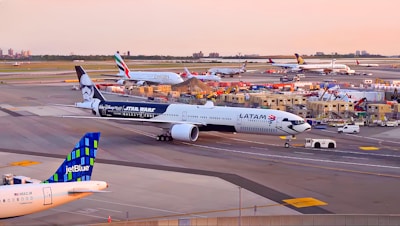 a large jetliner sitting on top of an airport tarmac