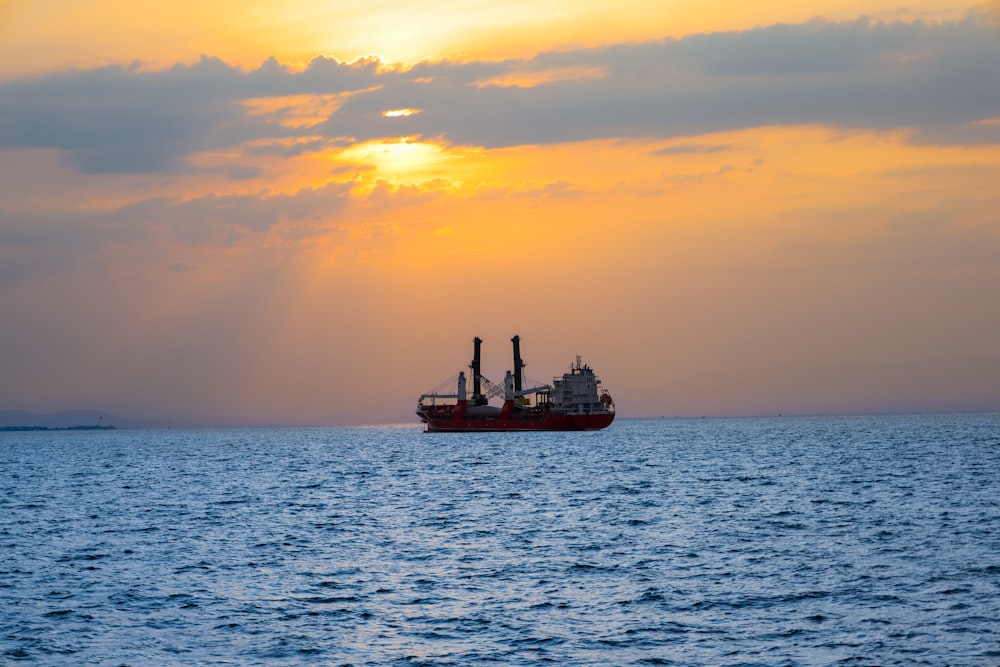 a large boat floating on top of a large body of water