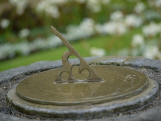 Close-up of an ancient sundial casting shadows to mark time.