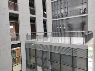 Installation of advanced aluminum partitions and louvers in a commercial space.