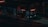 A bus is parked at a dimly lit bus station during nighttime. The bus has glowing red and white LED lights displaying route 69. The surrounding area is dark, with shadows cast on the ground and minimal ambient light. The station appears empty, with no visible people around.