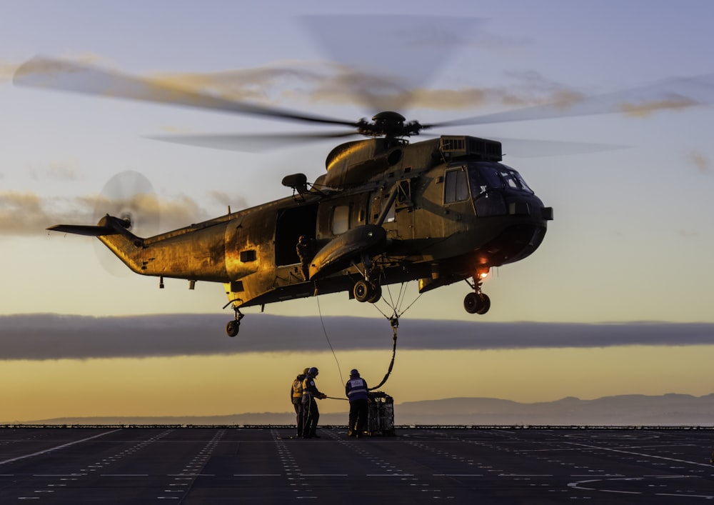 a helicopter that is sitting on a runway