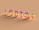 The image features the letters 'LGBTQ+' formed by colorful balloon-like structures on a light brown background. Each letter is constructed from balloons of various colors, including pink, purple, orange, yellow, green, and red.