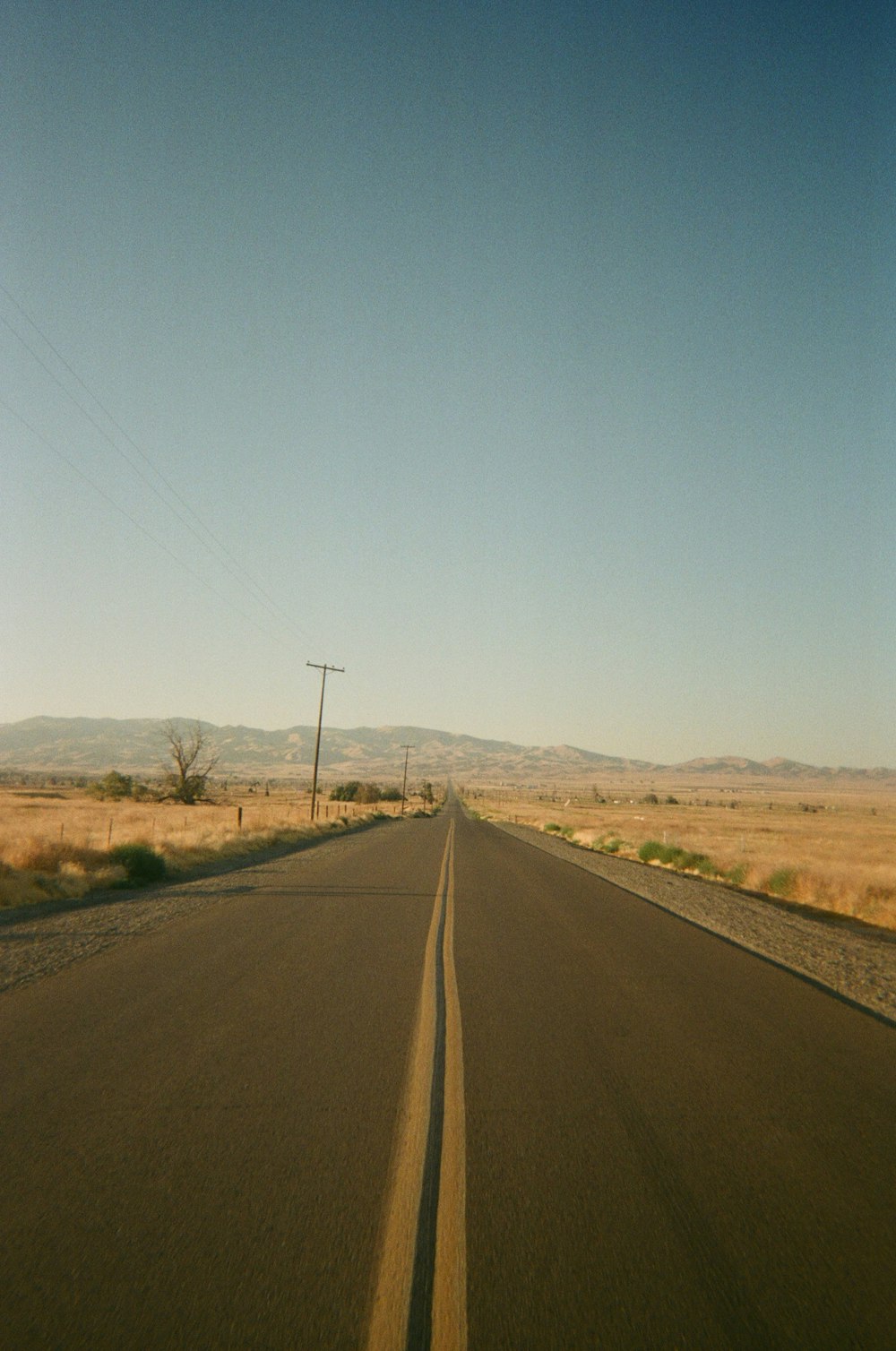 an empty road in the middle of nowhere