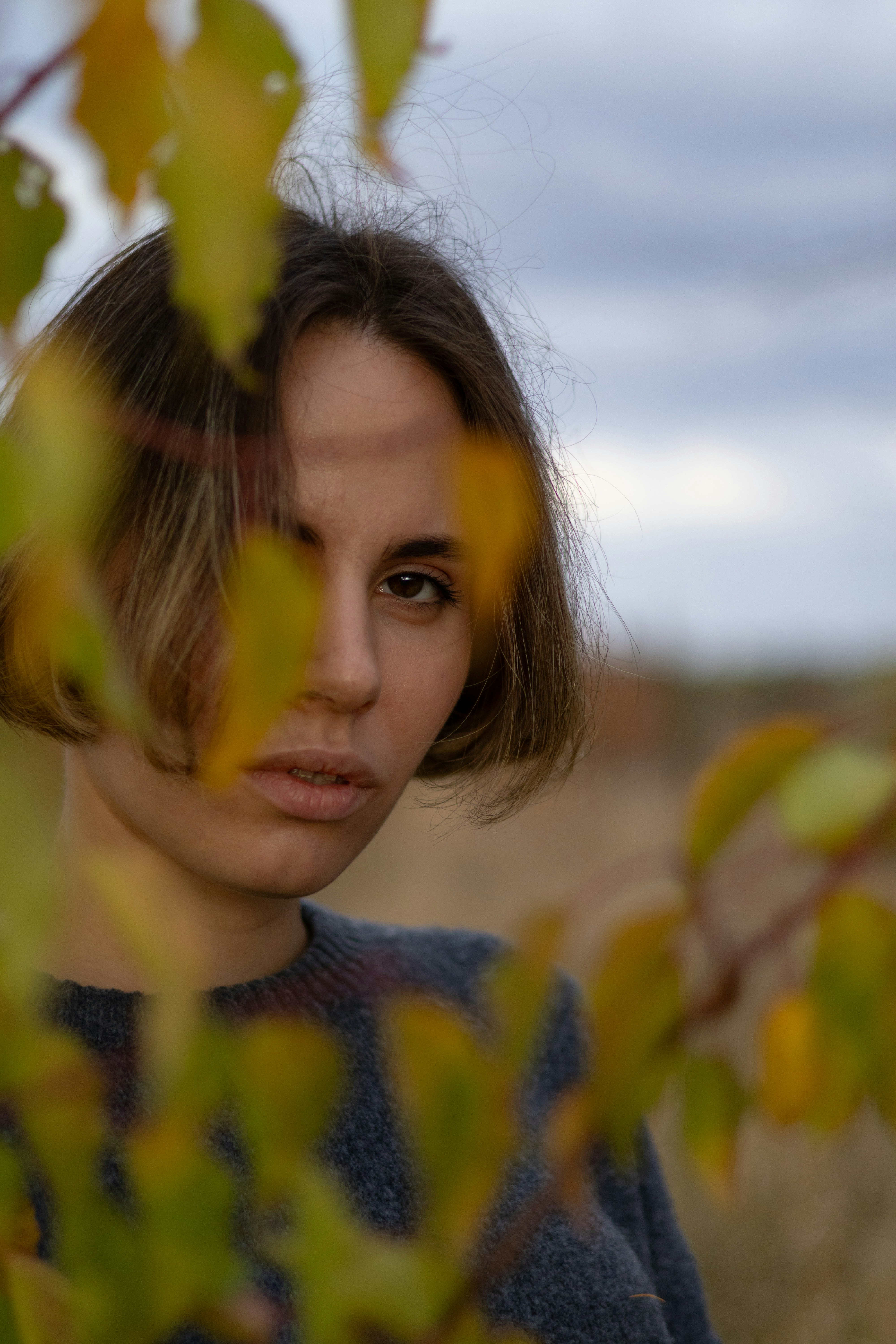 a woman with a serious look on her face