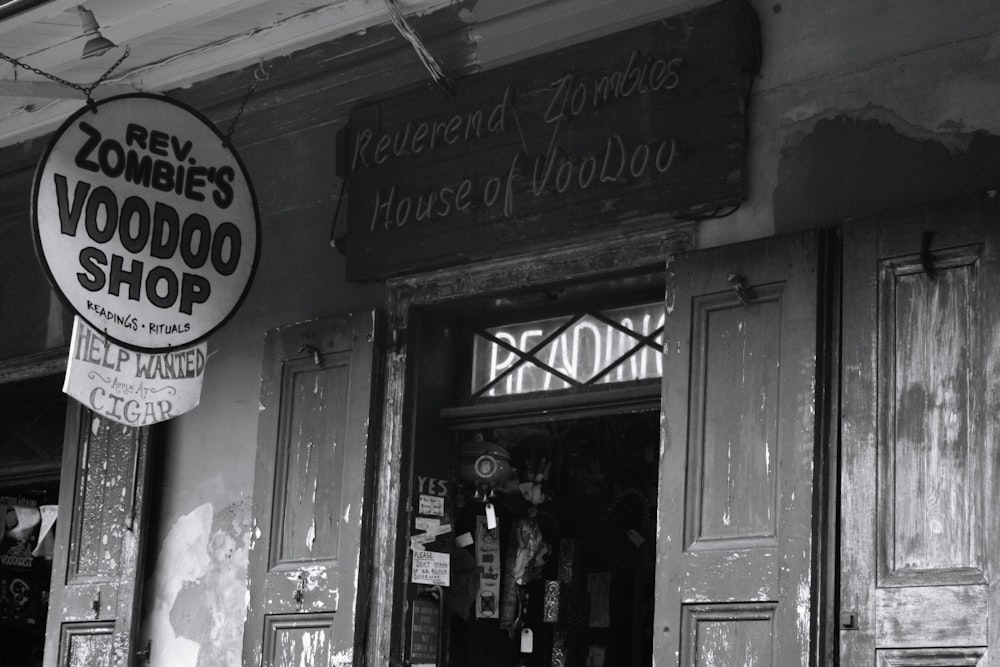 a black and white photo of a store front
