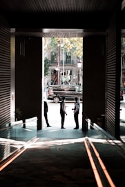 a group of people standing outside of a building