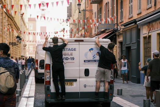 A professional technician collecting a specimen inside a sleek mobile testing van.