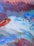 A vibrant abstract painting with dynamic swirls of color on a white canvas.