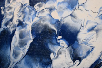 Abstract water texture in deep blue tones, evoking depth and tranquility.