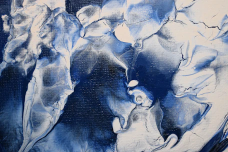 Abstract water texture in deep blue tones, evoking depth and tranquility.