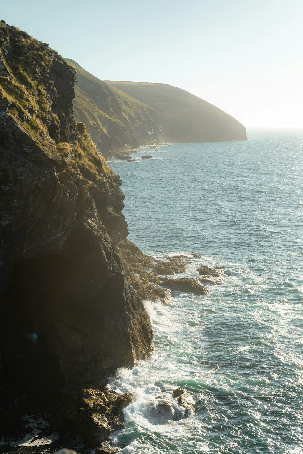 a view of the ocean from a cliff