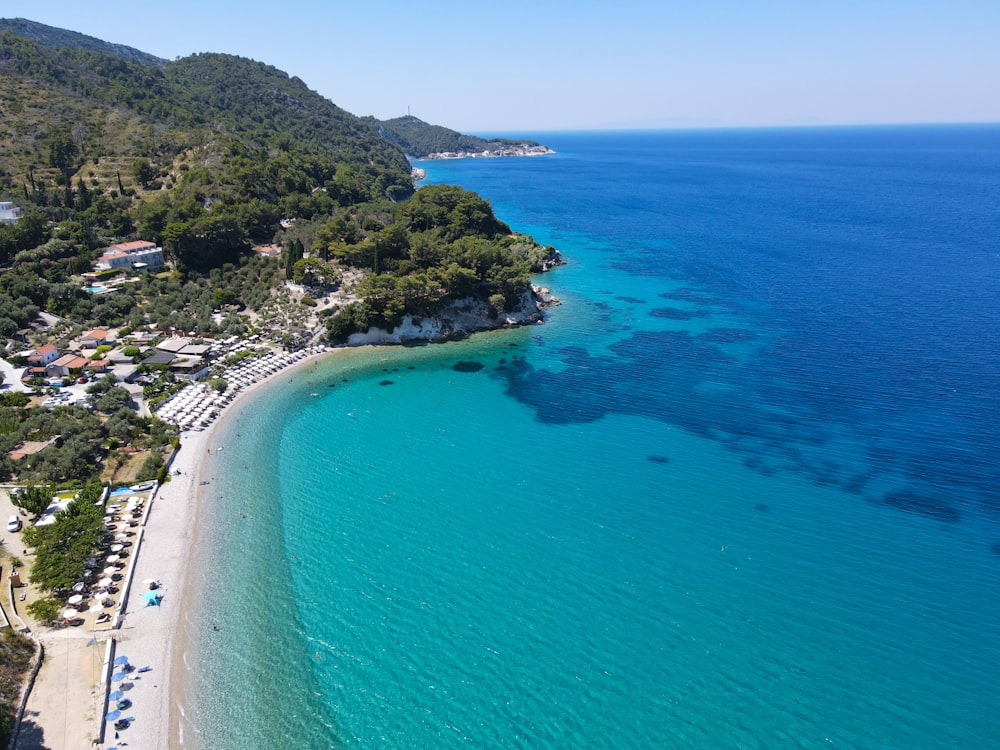 an aerial view of a beach and a resort