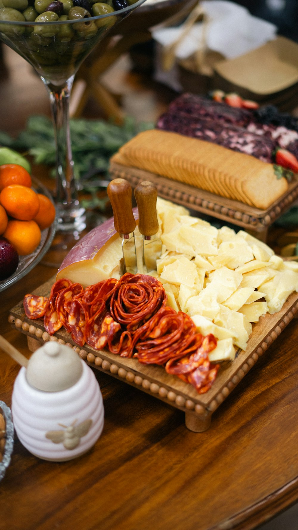 a wooden table topped with different types of food