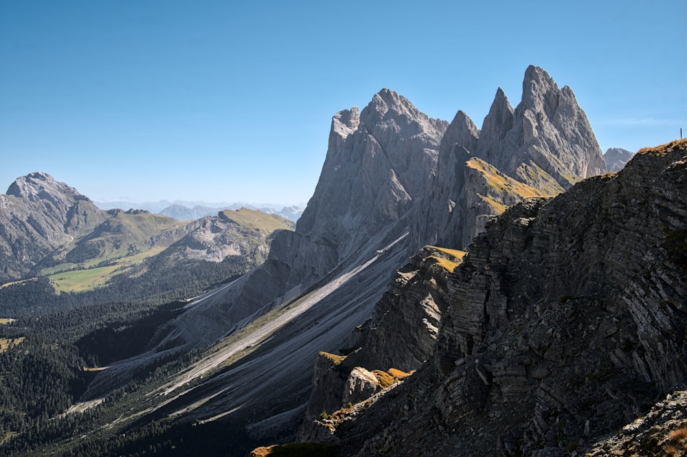 a view of a mountain range from the top of a mountain