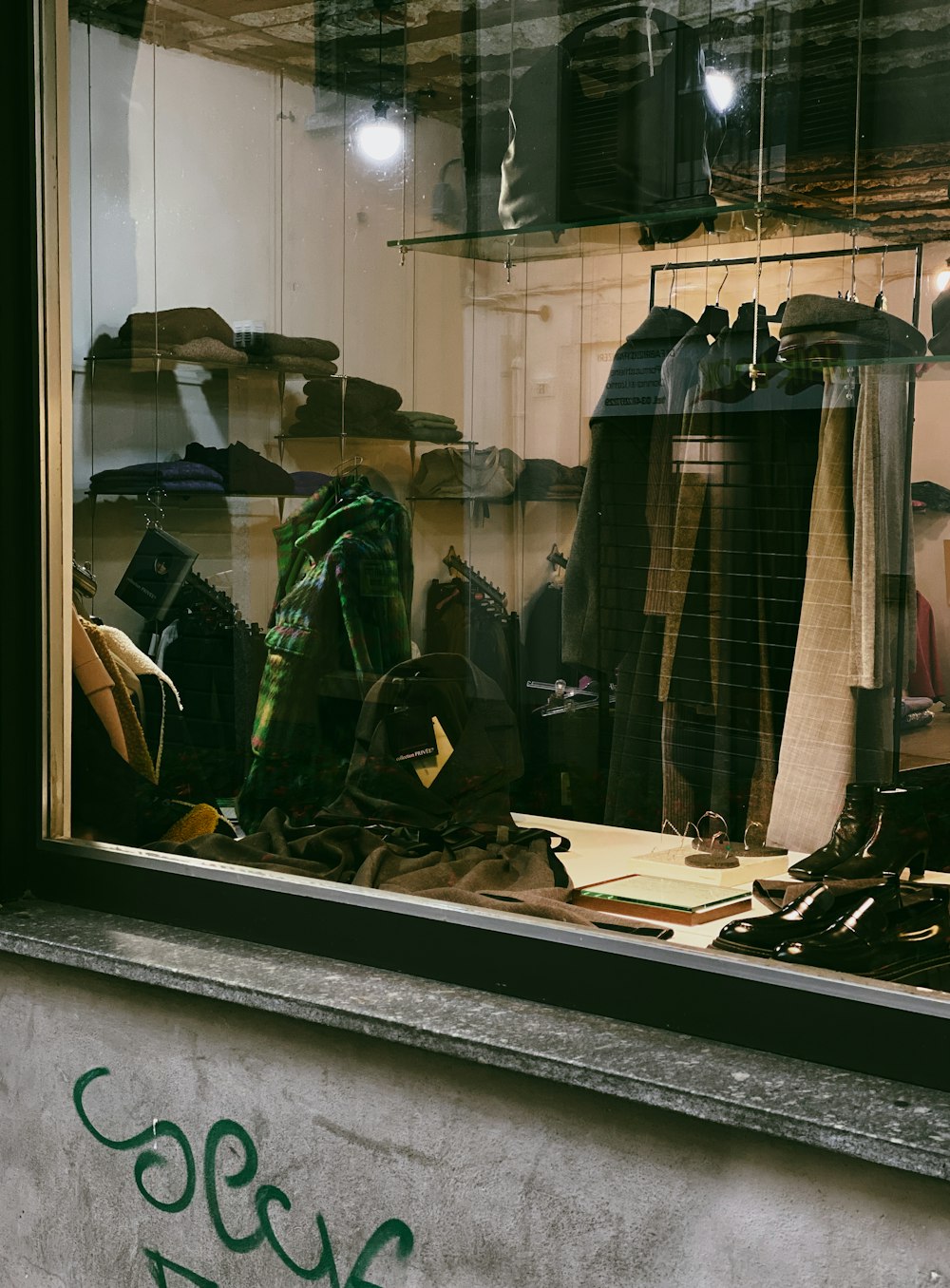 a window with a bunch of clothes in it