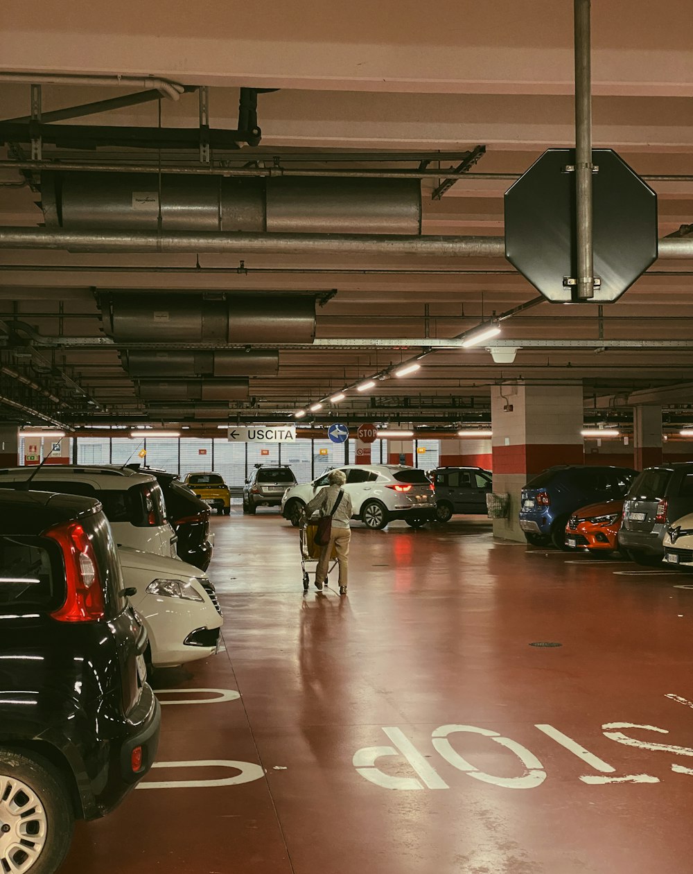 a parking garage filled with lots of cars