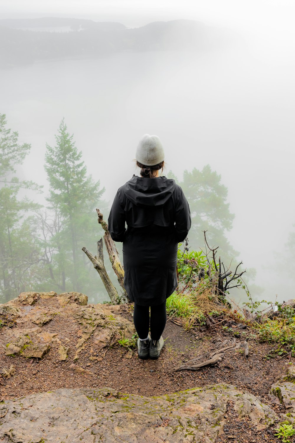 a person standing on top of a mountain