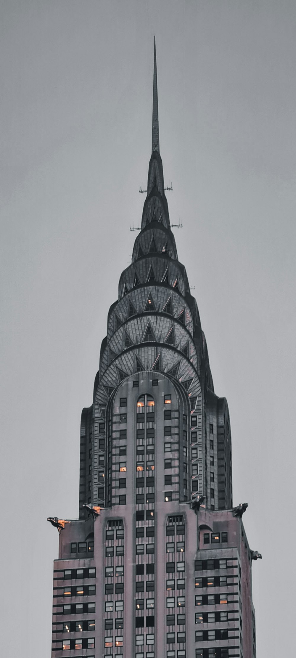 a very tall building with a very tall spire