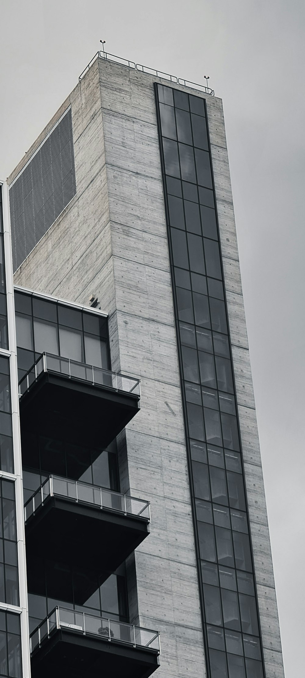 a tall building with a clock on the top of it