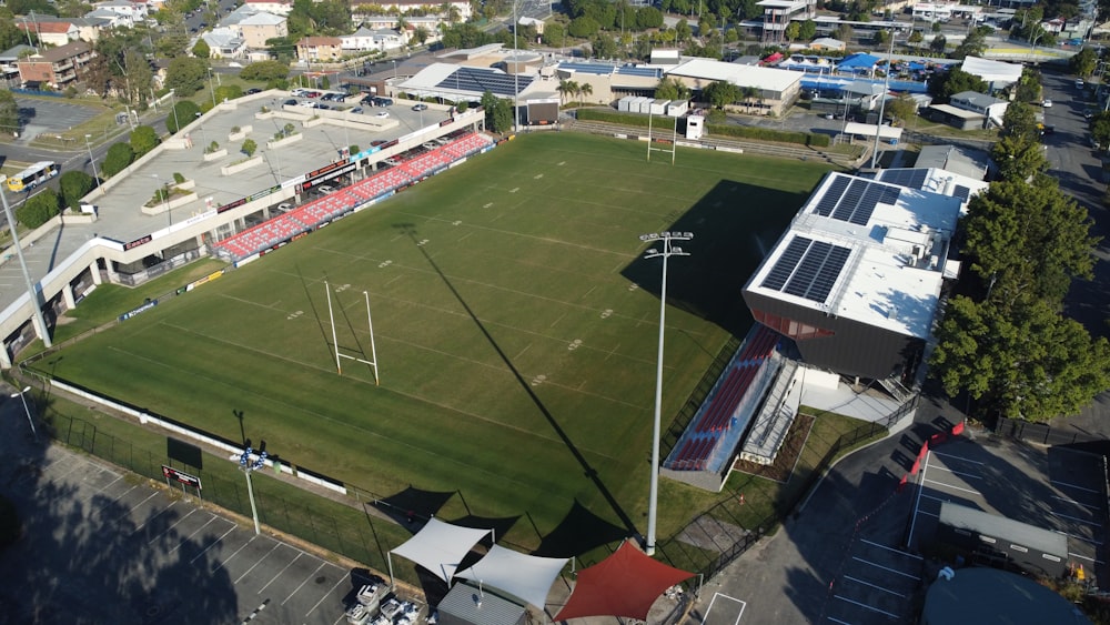 an aerial view of a soccer field in a city