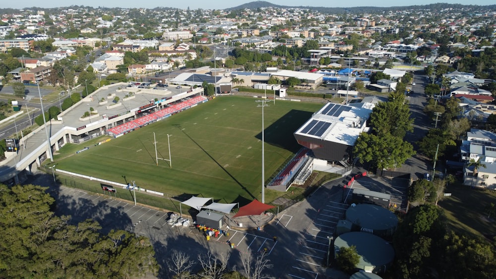 an aerial view of a soccer field in a city