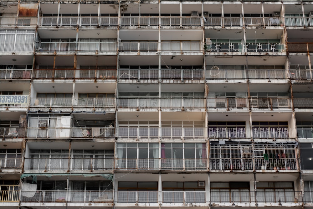 a very tall building with lots of balconies