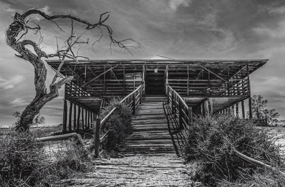 a black and white photo of a wooden structure