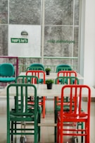 A vibrant dining area showcasing bold colors and unique furniture pieces.