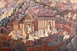 Close-up of colorful traditional artwork depicting local legends inside a temple.