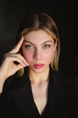 a woman in a black shirt posing for a picture