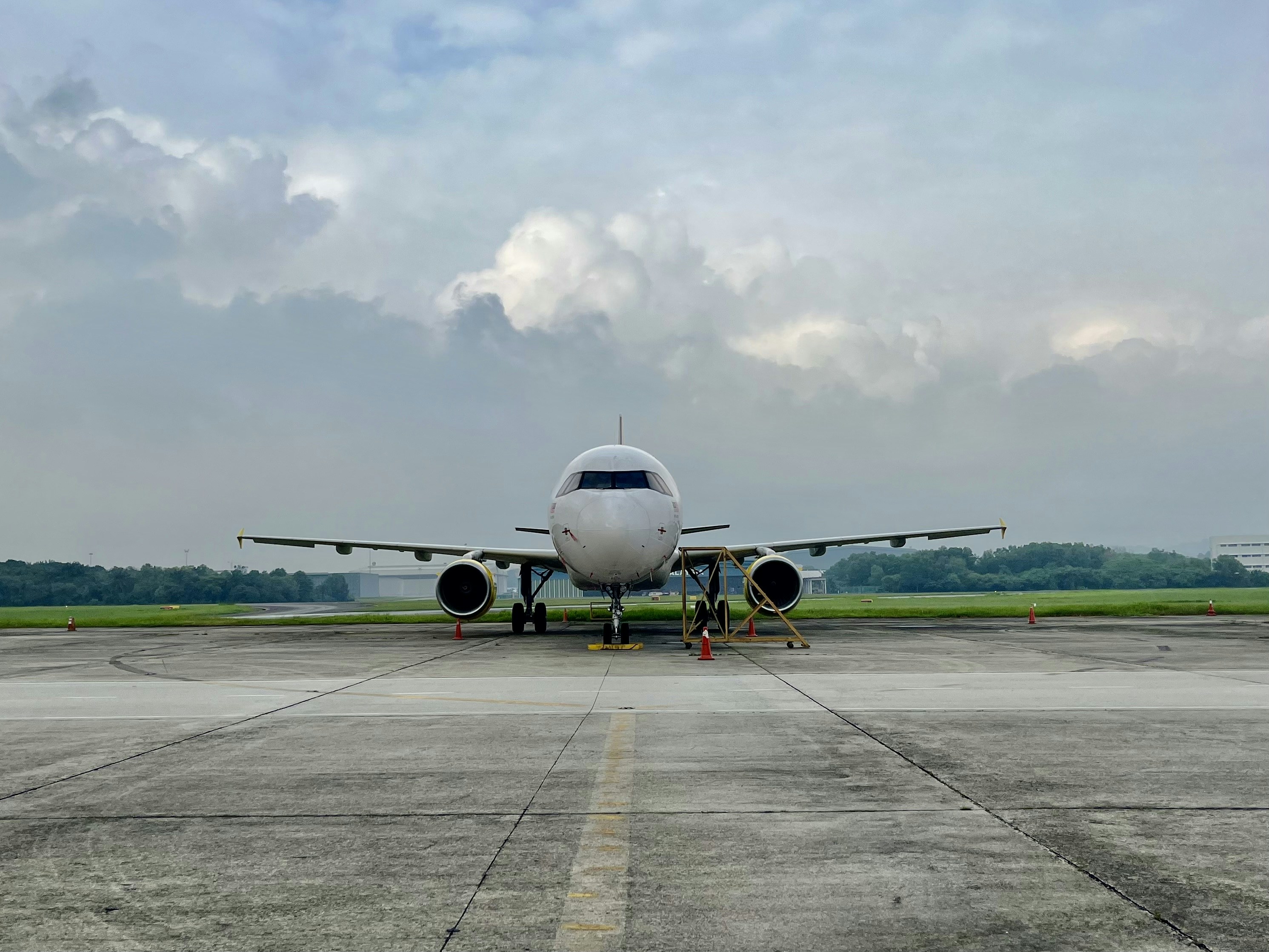 a large jetliner sitting on top of an airport tarmac