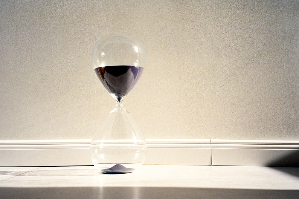 an hourglass sitting on top of a counter