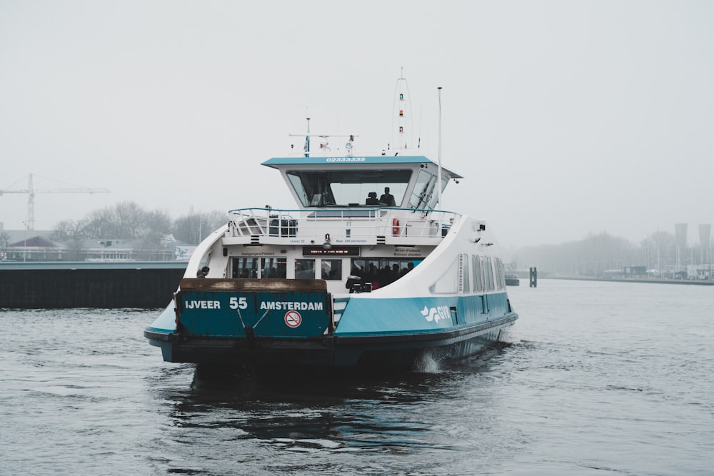 a large boat floating on top of a body of water