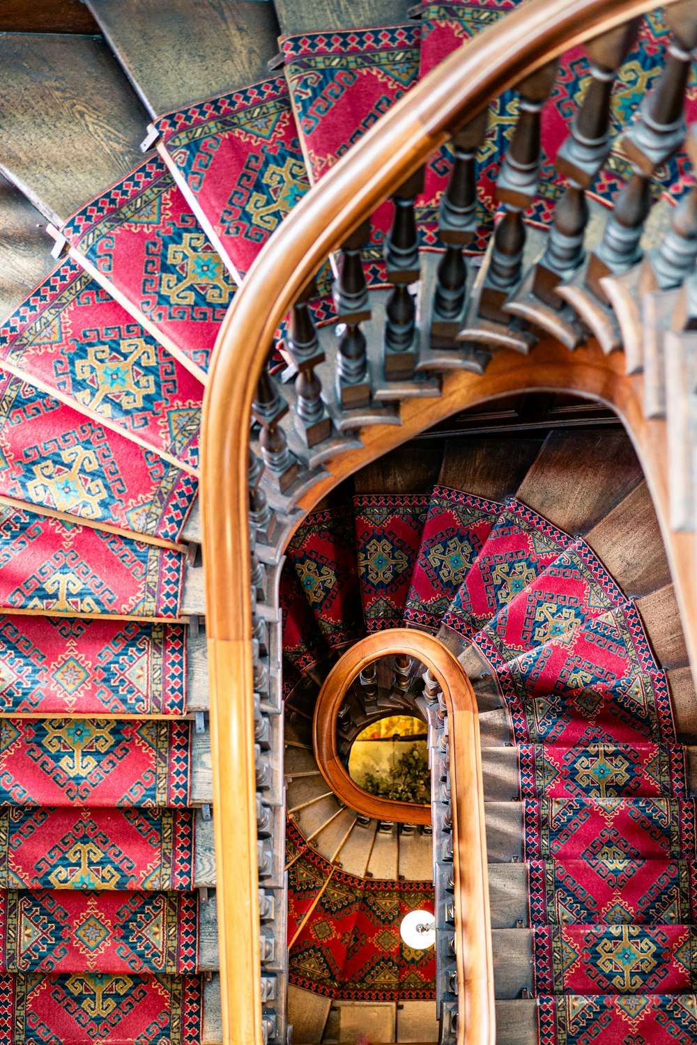 a view of a spiral staircase from the top