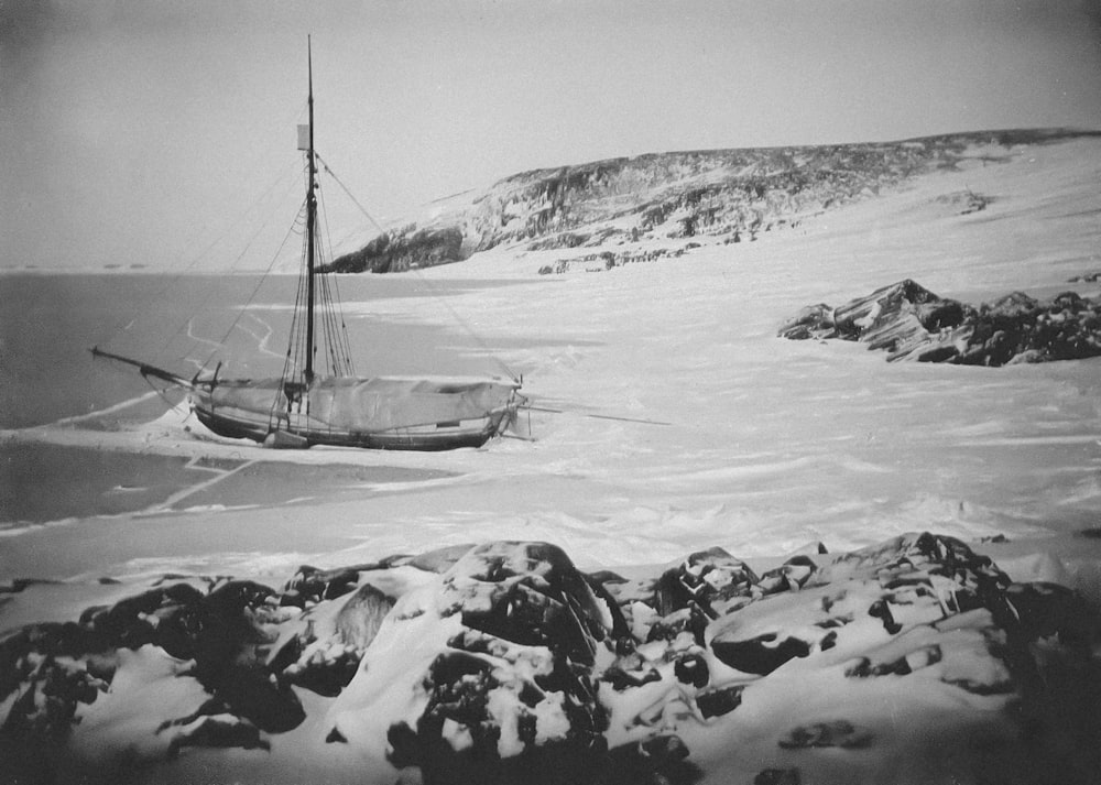 a boat floating on top of a large body of water