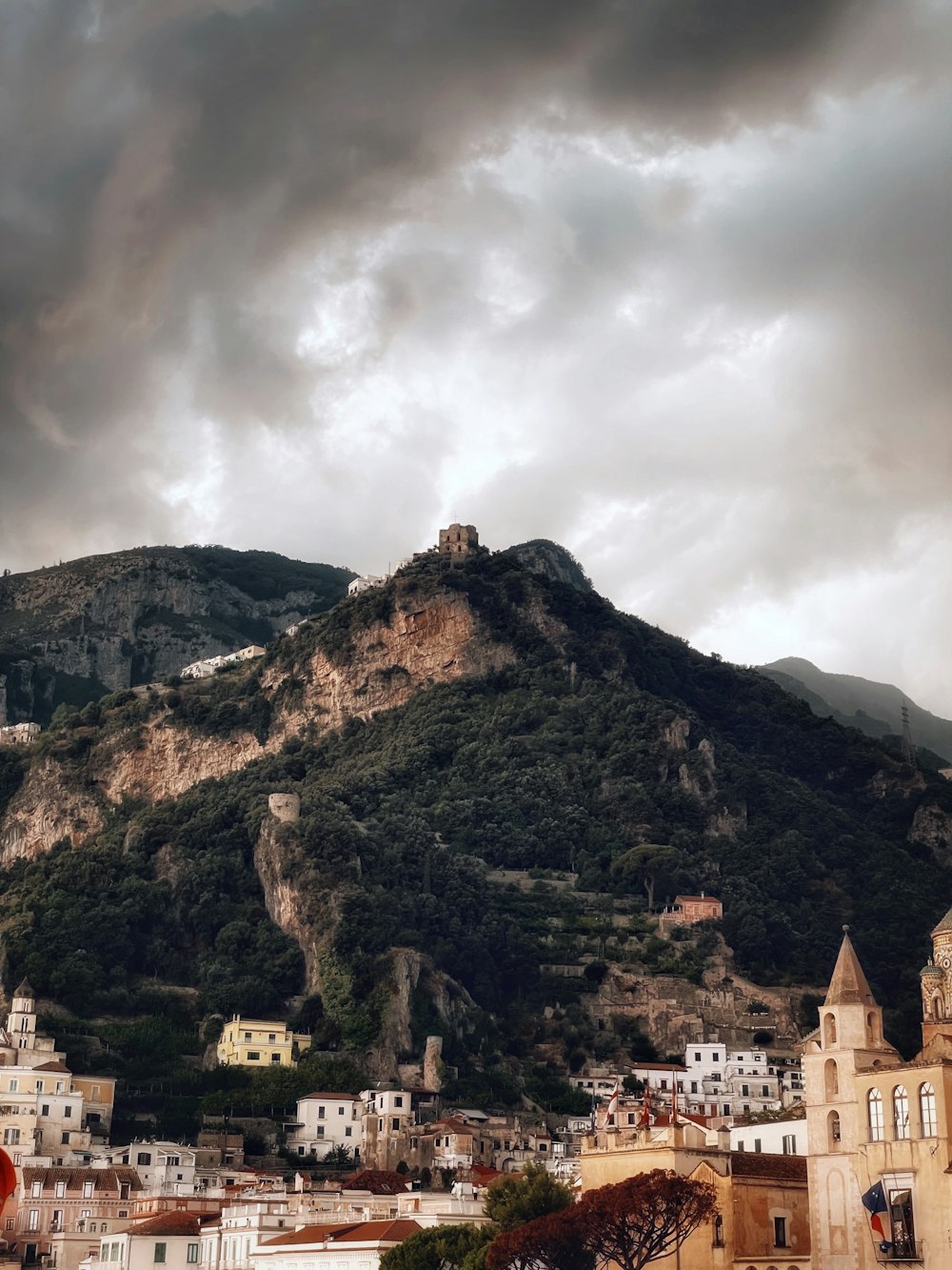 a large hill with a castle on top of it