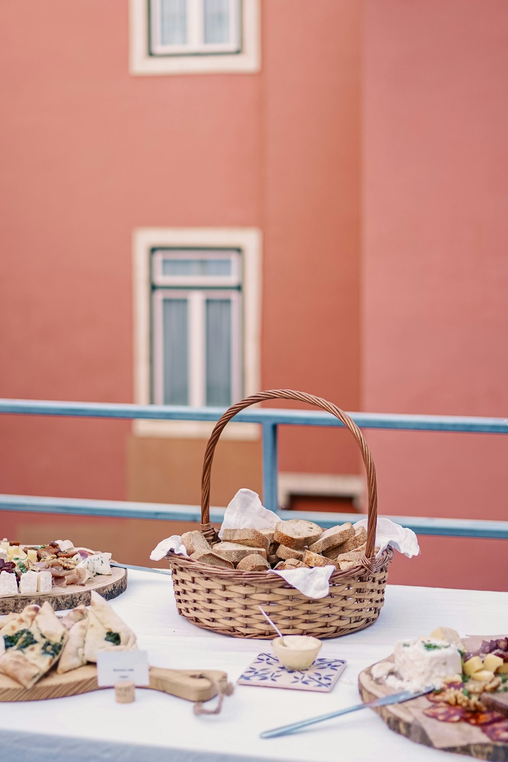 a table with a basket of food on it