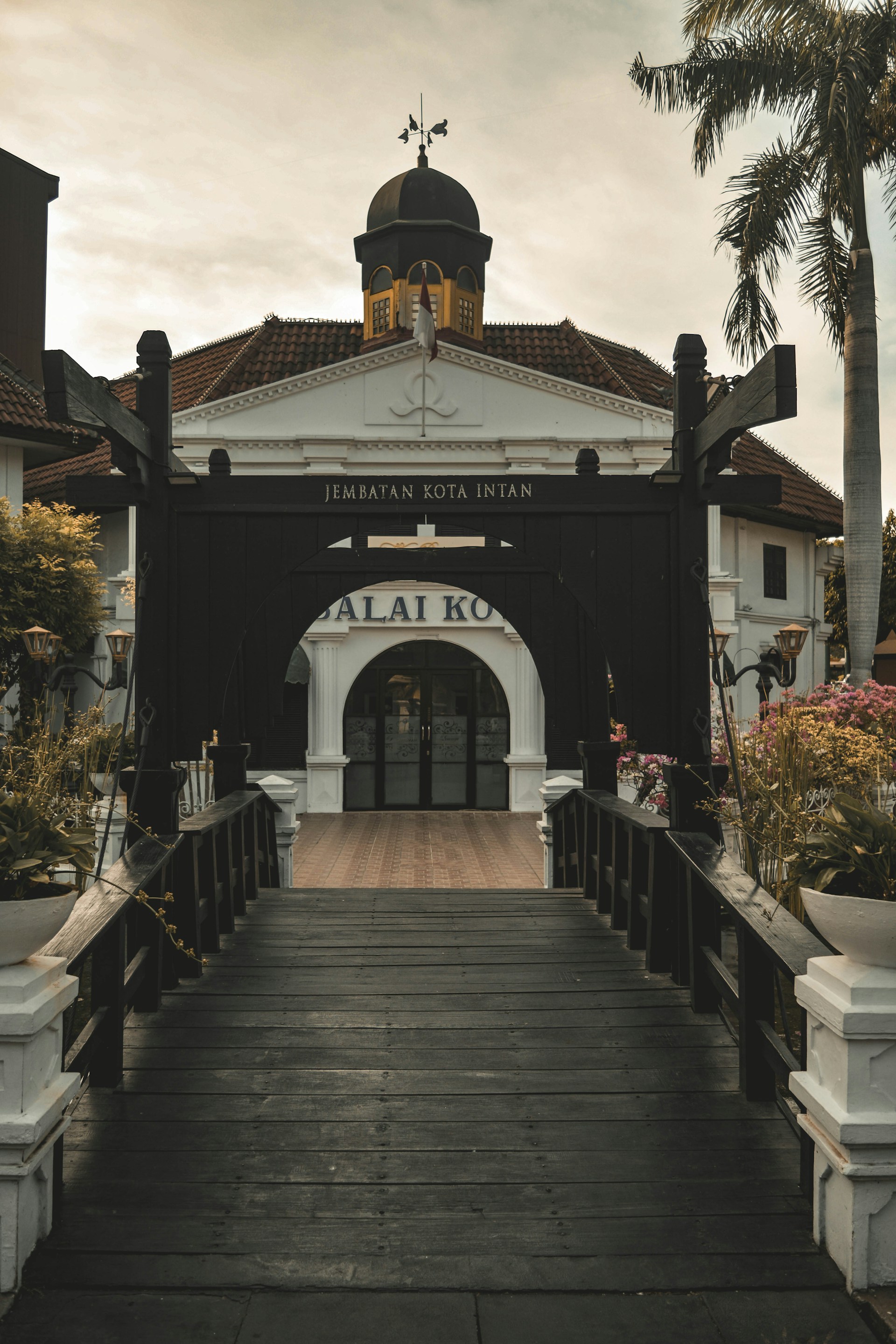a black and white building with a clock tower