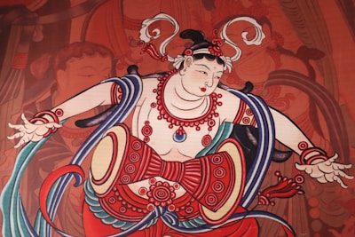 A vibrant mural depicting traditional Indian motifs and patterns.