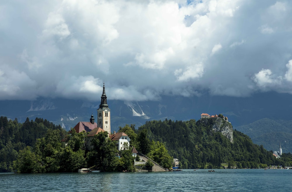 a church on a small island in the middle of a lake