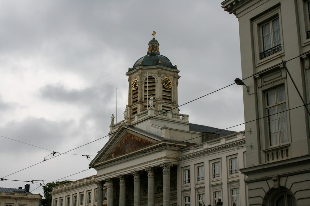 a large building with a clock tower on top