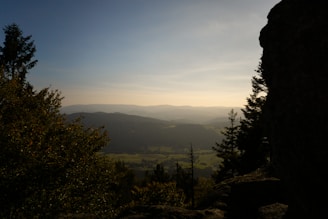 A serene landscape showcasing the rolling hills of Lazio at sunset.