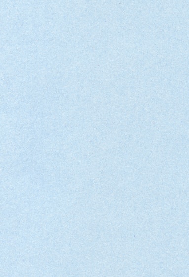 an airplane is flying in the sky on a clear day